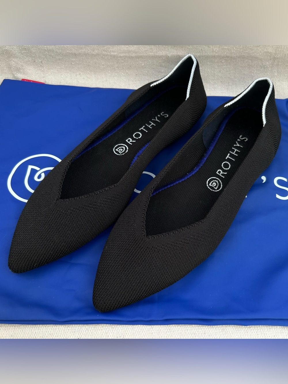 Rothy's Black Pointed Knit Flats with White Trim